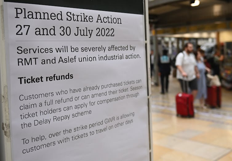 White poster listing dates for planned strike action by transport unions on July 27 & 30 2022