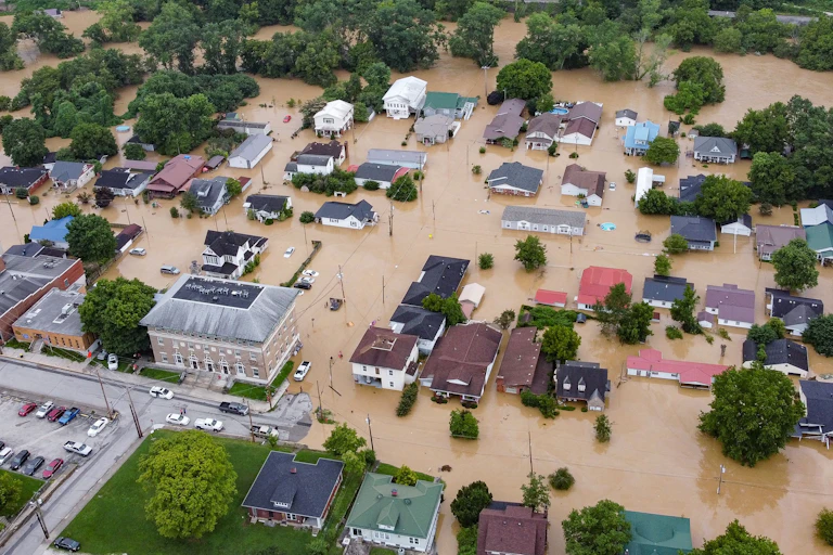Dozens of homes and businesses in Jackson, Kentucky, surrounded by flood water.