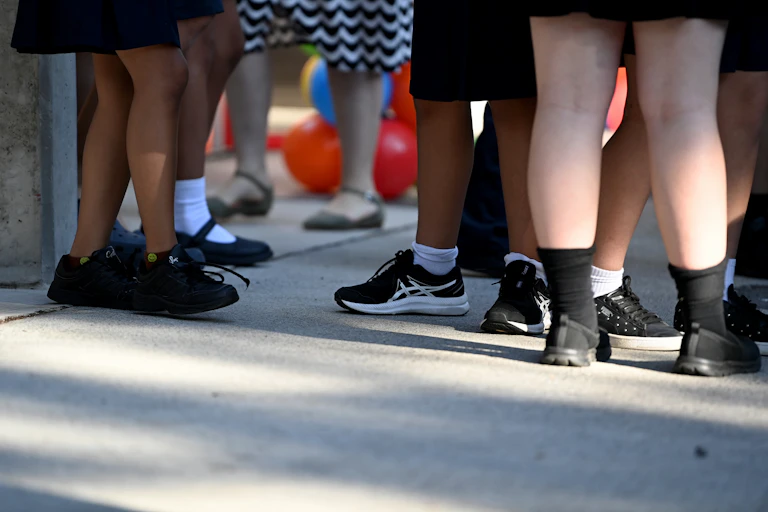 School kids waiting in a playground