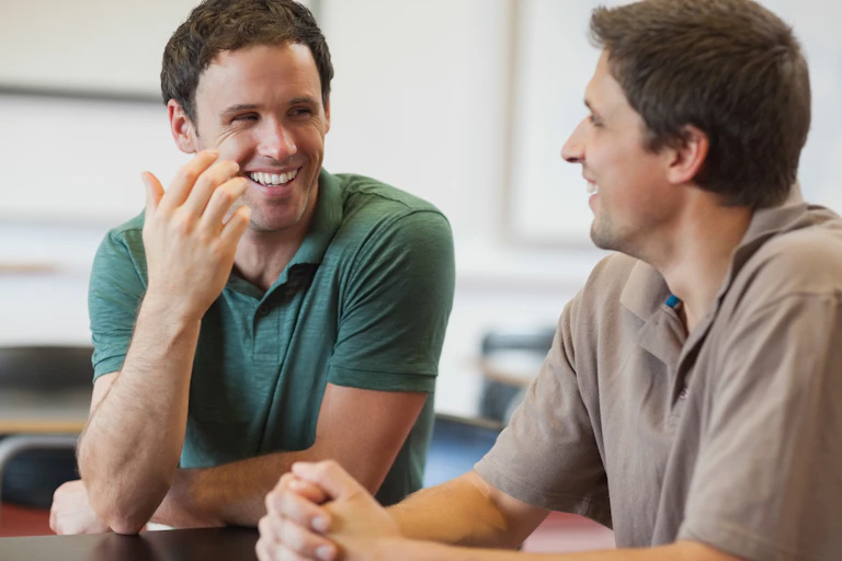 two young men talking