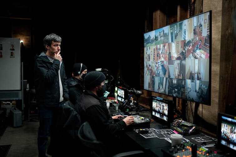 Nathan Fielder looks over security footage.