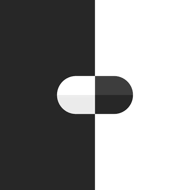 Illustration of black and white pill against black and white background