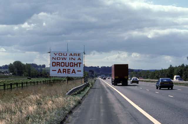 Drought warning sign by motorway