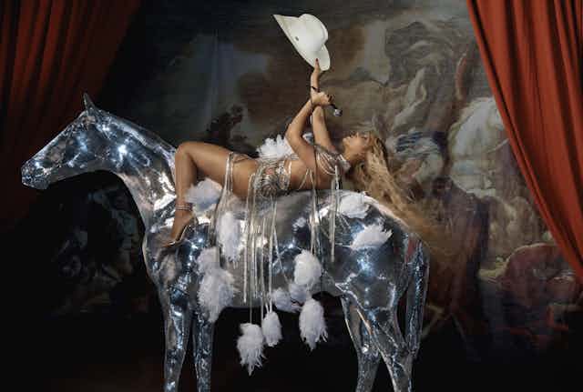 Beyonce on a horse statue,