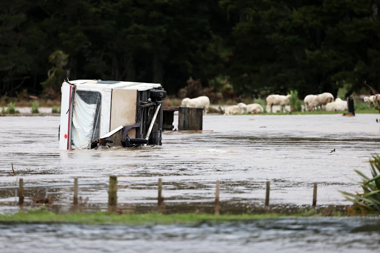 A caravan partly submerged during recent floods in the Auckland region.
