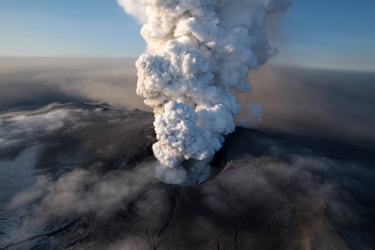 A huge ash plume erupted from the top of a volcano