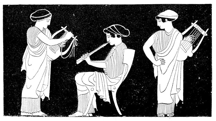 Ασπρόμαυρη εικόνα γυναικών που παίζουν μουσικά όργανα.