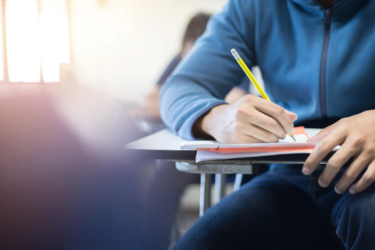 Student sitting an exam.