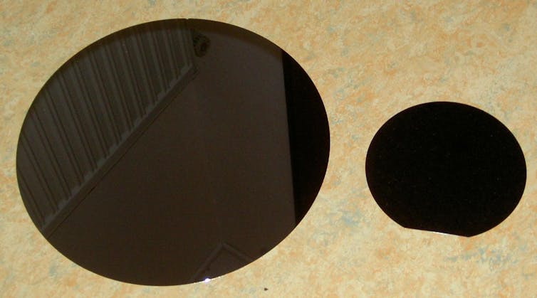 Two shiny black discs.