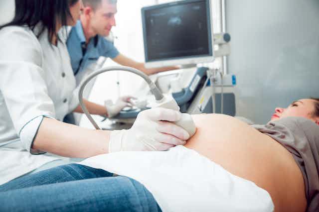 pregnant woman getting ultrasound