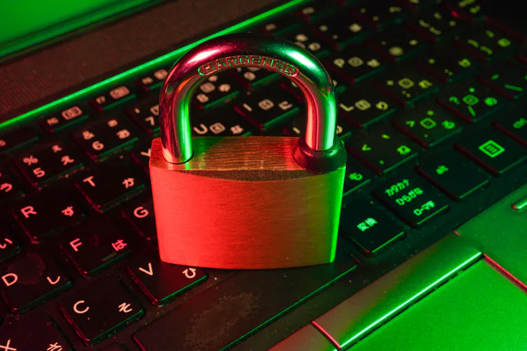 A lock sits on top of a keyboard