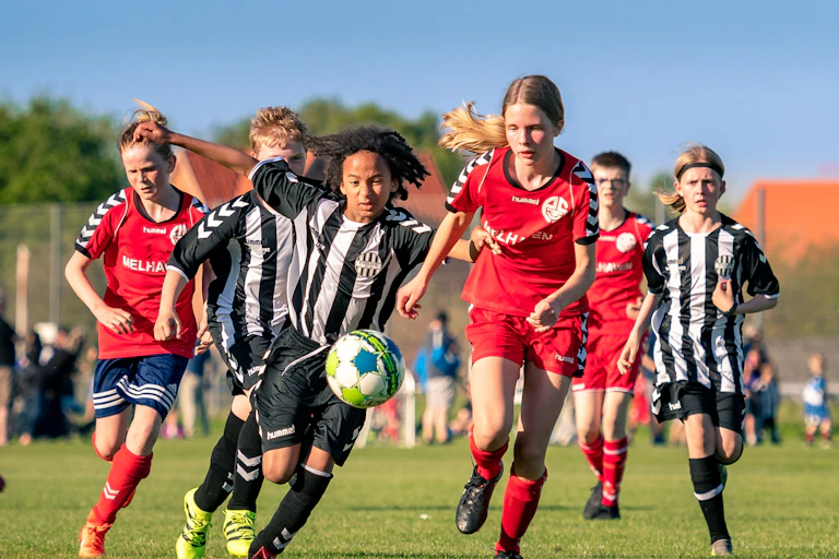 Kids playing soccer