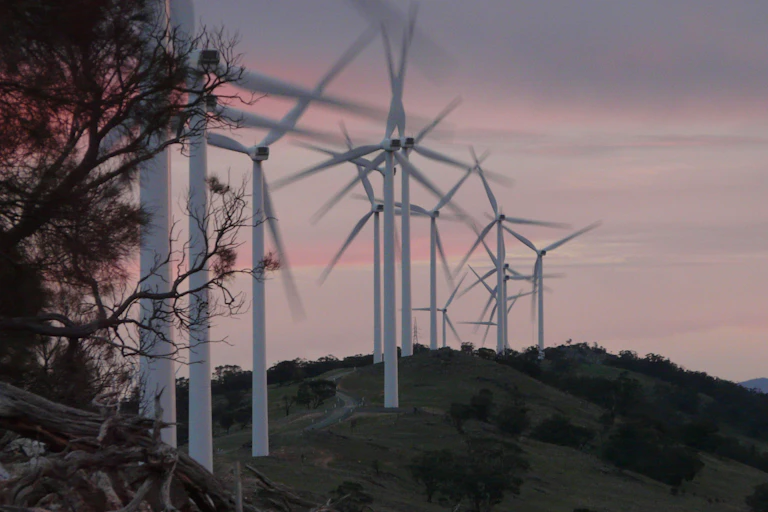 Wind turbines on a hill at subset