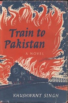 A book cover showing a burning train