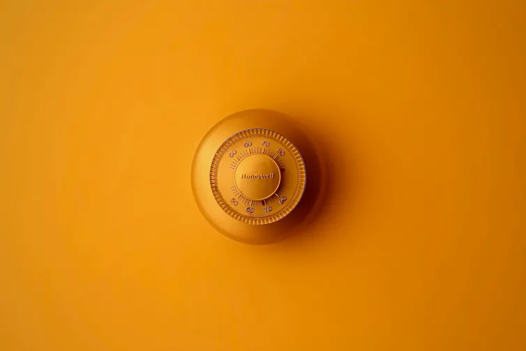A thermostat on a wall