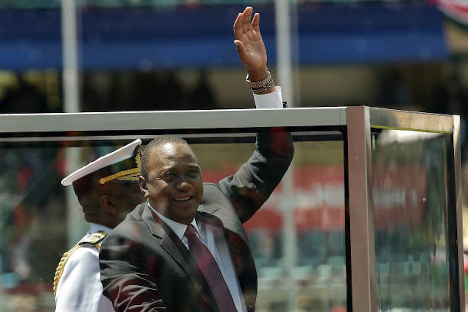 Uhuru Kenyatta waves to supporters