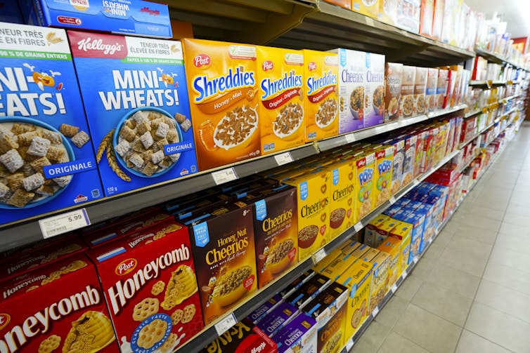 Cereals and cereal products displayed for sale at a grocery store