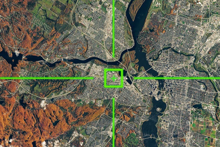 satellite view of land on Earth with a green location square