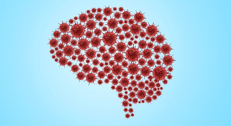 Viruses of red color arranged in the form of a brain on a blue background.