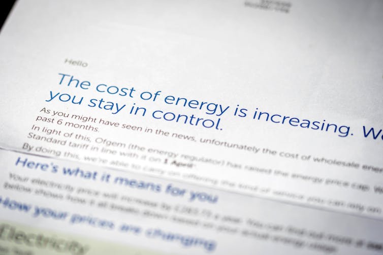 A letter reading 'the cost of energy is increasing'.