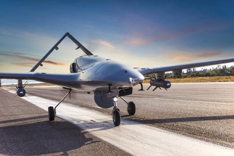 Armed Autonomous aerial vehicle on runway