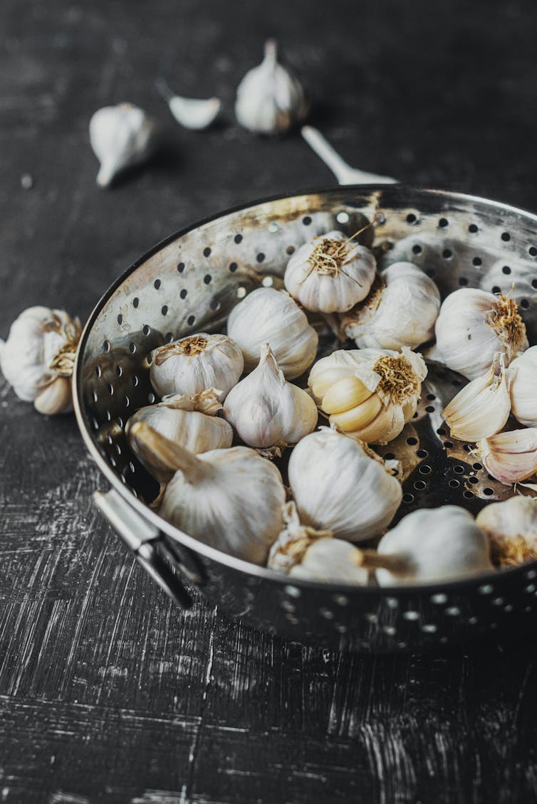 Garlic in a sieve