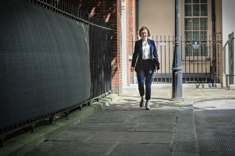 Liz Truss walking down Downing Street.