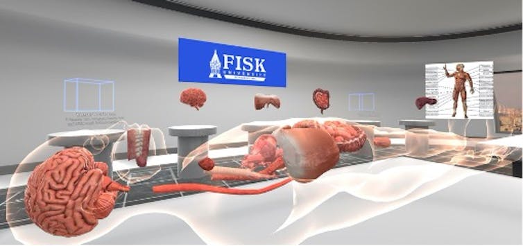 A virtual cadaver lies on a table in a virtual lab.