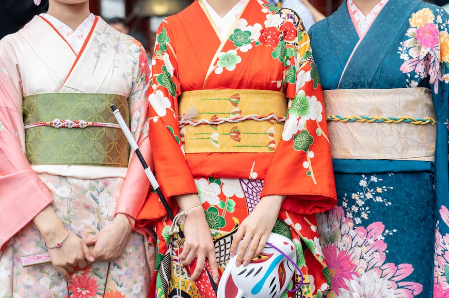 Three women in kimonos. 