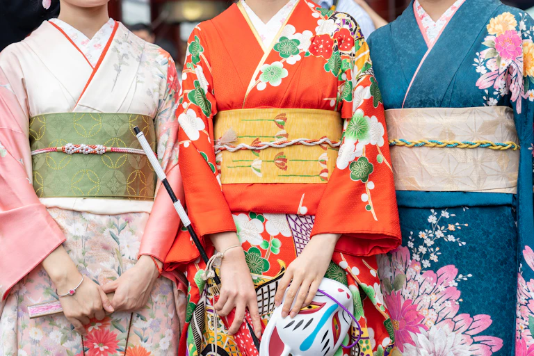 Three women in kimonos.