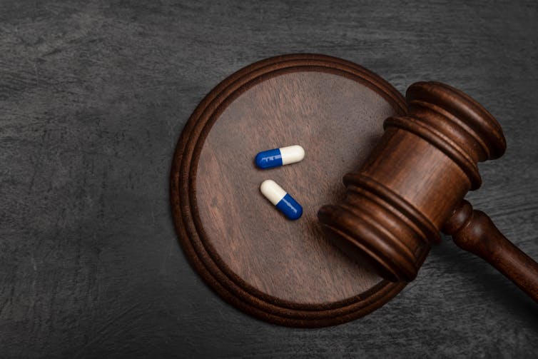 Pills by a judge's gavel