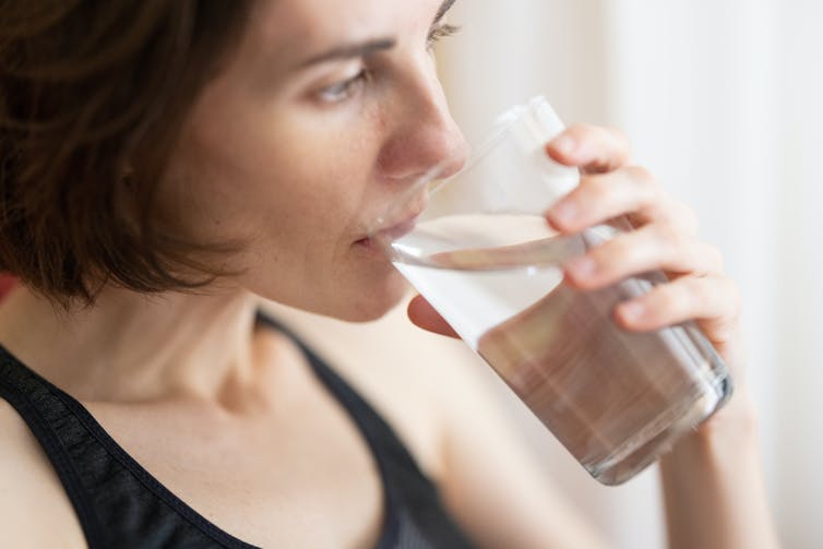 Woman drinks water