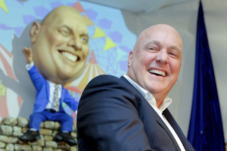 Christopher Luxon unveiling his puppet caricature at Backbencher Pub on August 3, 2022