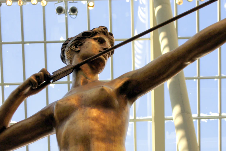 Statue of Diana shooting an arrow.