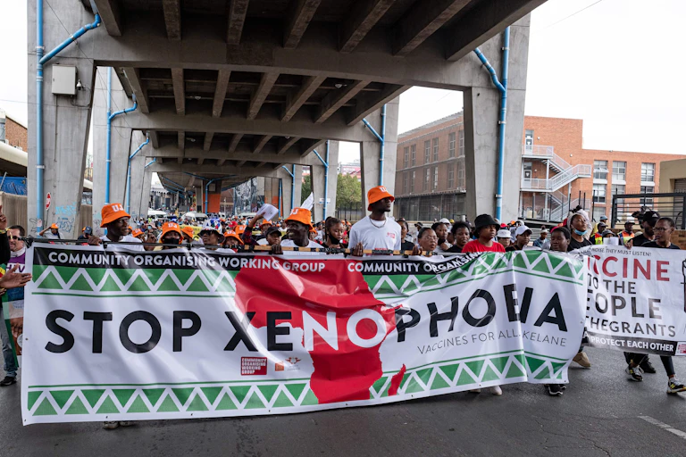 South African and foreign migrants demonstrate against in Johannesburg.
