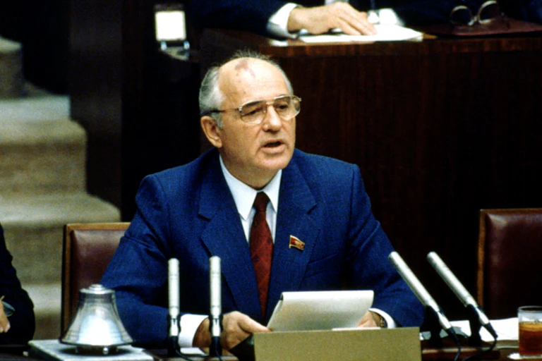 A man in a blue suit.