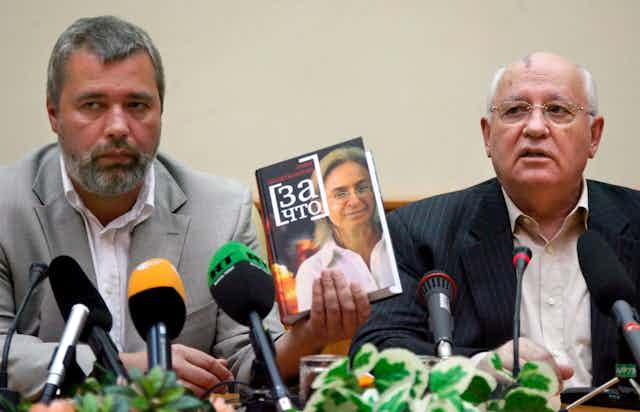 Mikhail Gorbachev in 2007 with the editor of independent Russian newspaper Novaya Gazeta, holding a book about the murdered reporter Anna Politkovskaya.