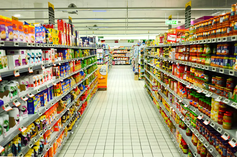 Supermarket aisle containing food products