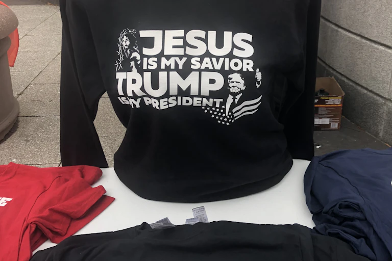 A T-shirt says 'Jesus is my Savior, Trump is my president'