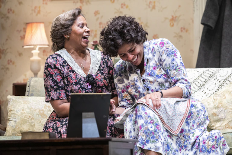 Two Black women on a couch