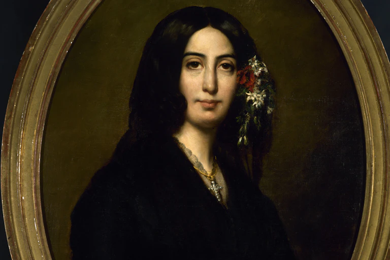 Retrato de una mujer con flores en el pelo.