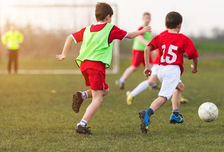 Boys playing football