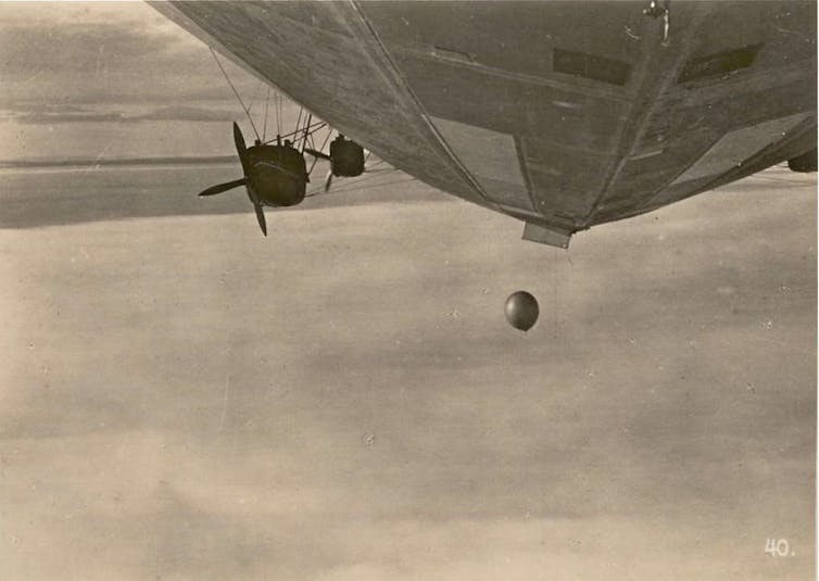 A balloon is launched from below the airship