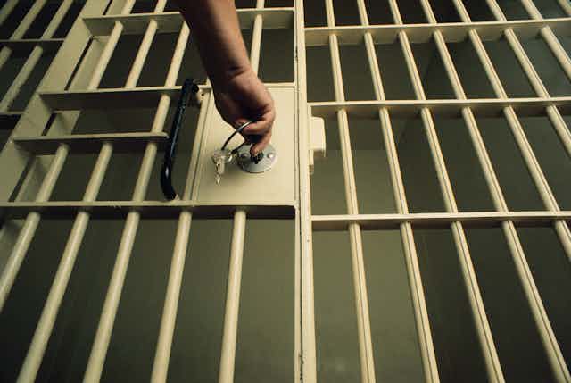 prison cell with guard locking