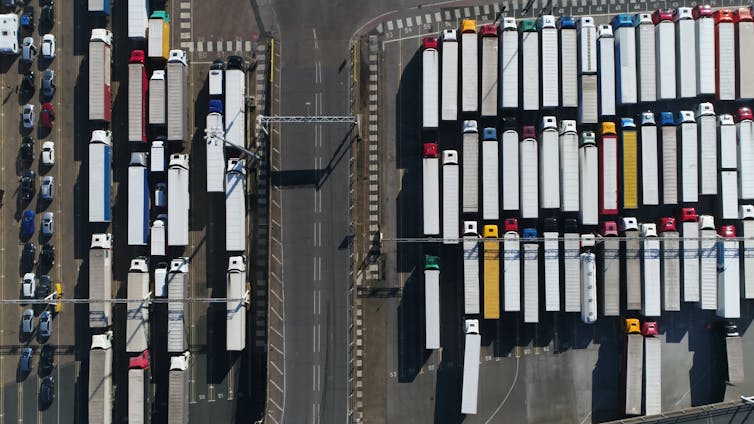 Parked lorries viewed from above.