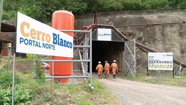 Miners enter a mining site
