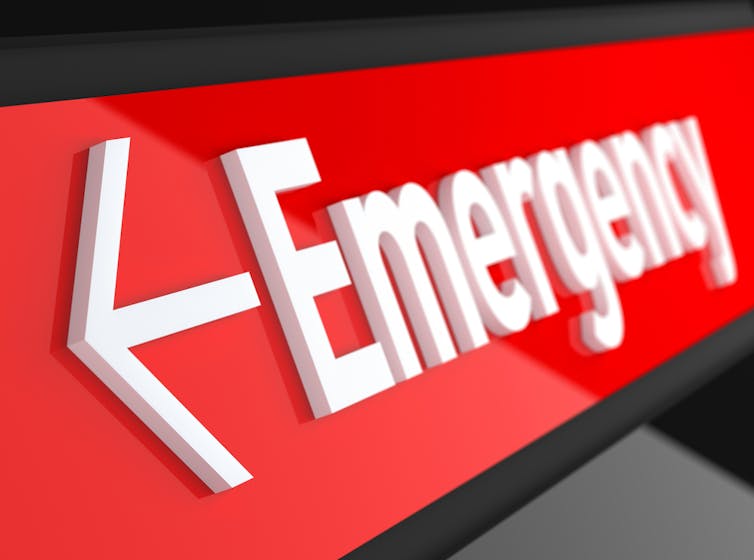Emergency department sign with arrow