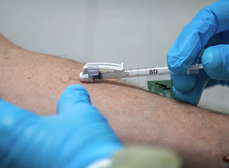Person receiving a monkeypox vaccine.