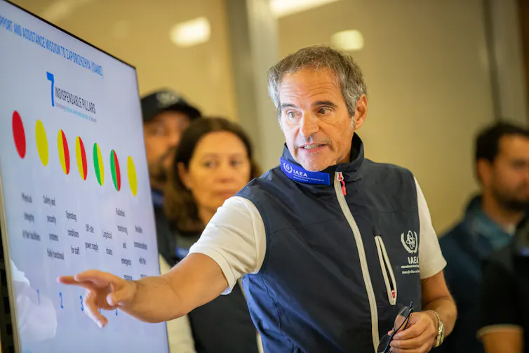 IAEA director-general, Rafael Mariano Grossi points to a diagram of Zaporizhizhia nuclear power plant at a press briefing in Vienna, September 2022.