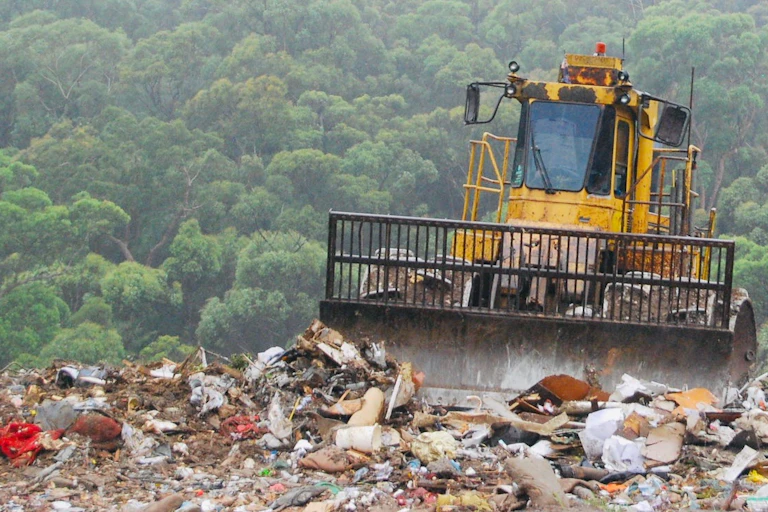 bulldozer at landfill site